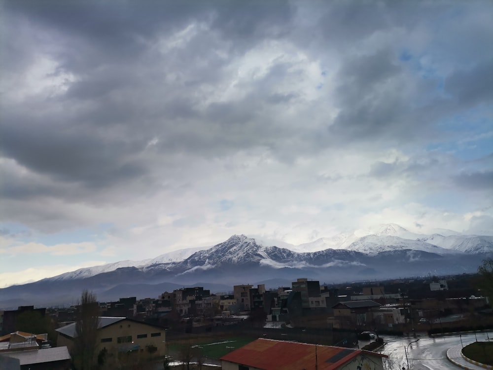 a view of a city with a mountain in the background