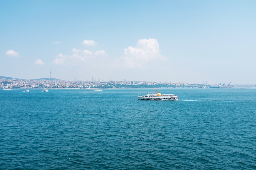 a boat traveling across a large body of water