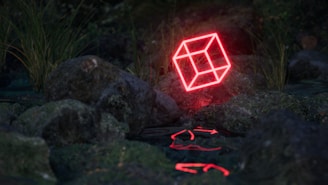 Behind-the-scenes shot of a game environment in development with wireframe overlays and asset placement