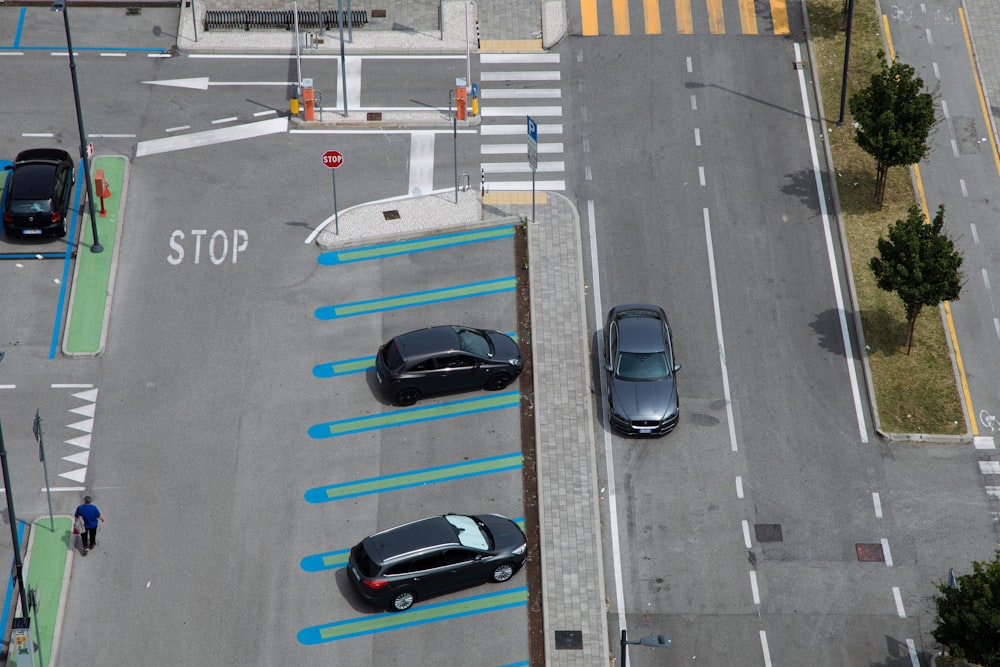 an overhead view of a parking lot with cars