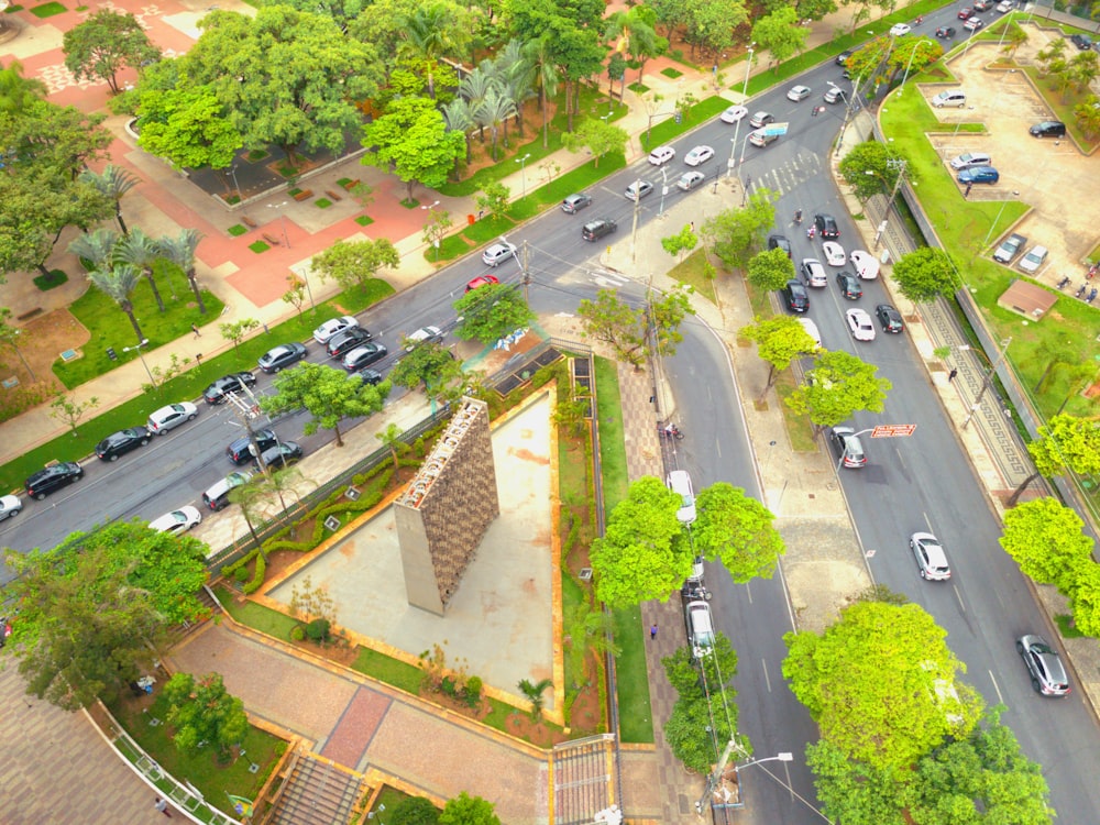 an aerial view of a parking lot and a street