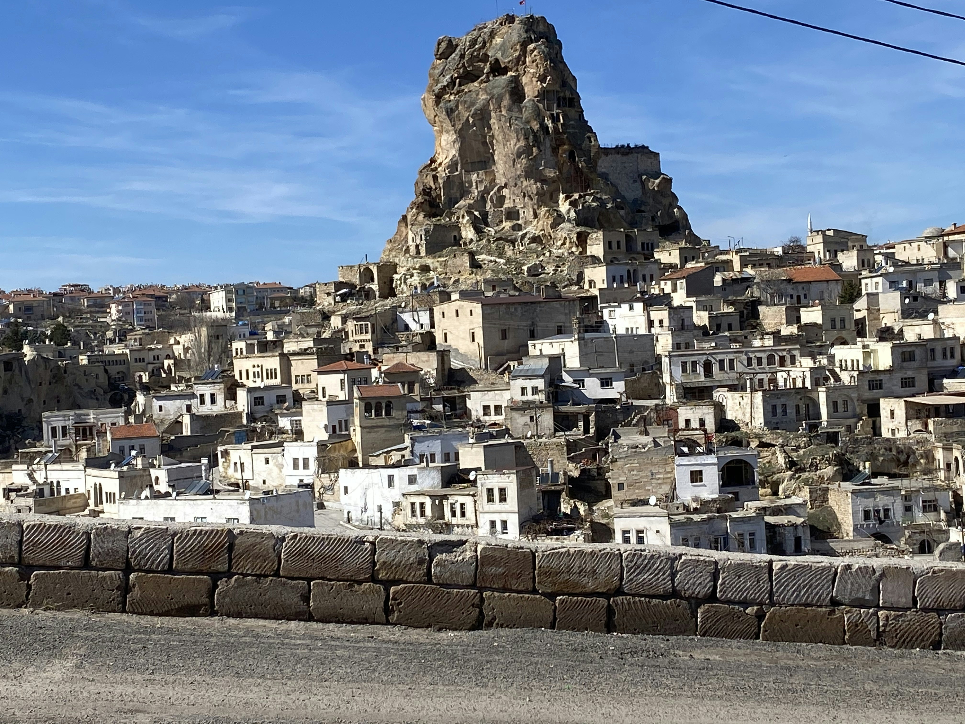 a city with a mountain in the background