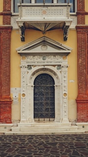 View of the entrance to il tempio di aton, showcasing elegant design and warm welcome.
