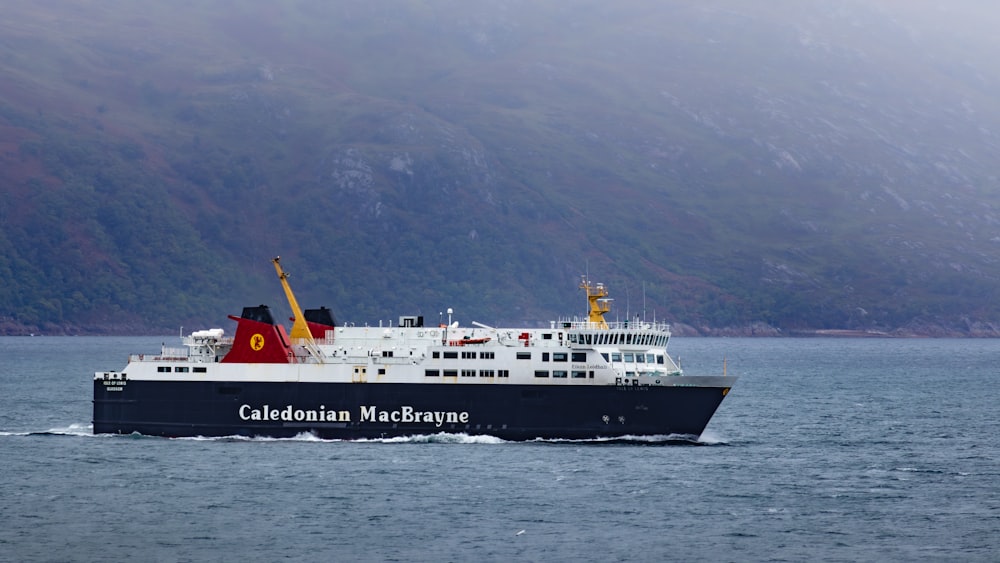 a large boat in the middle of a body of water