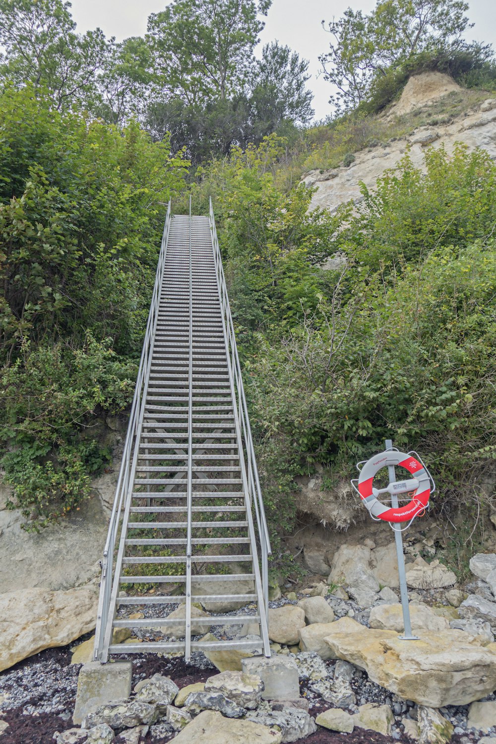 a set of stairs leading up to the top of a hill