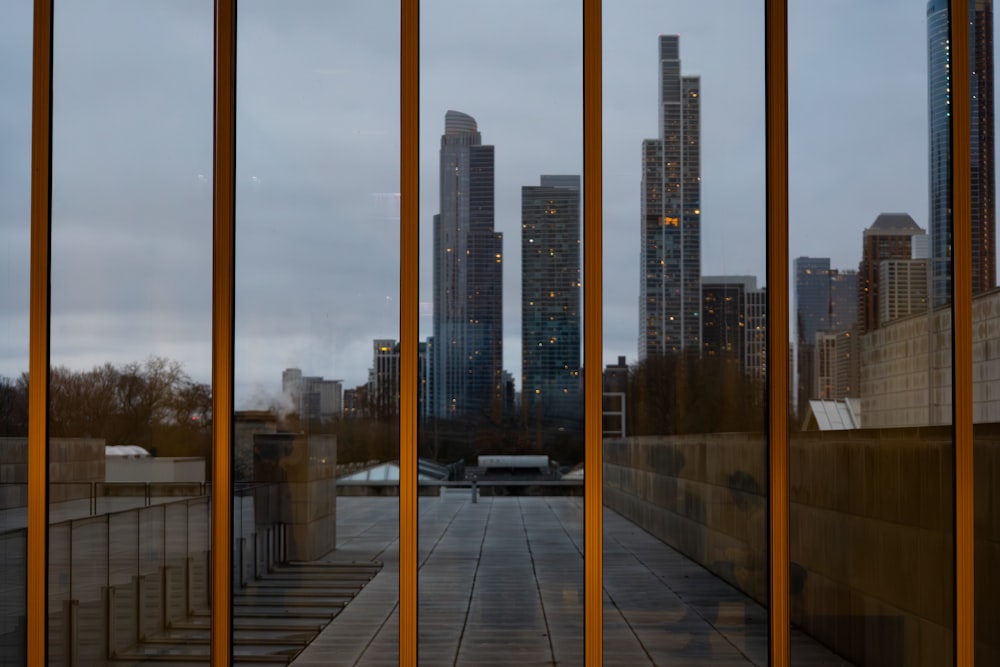 a view of a city through a glass window