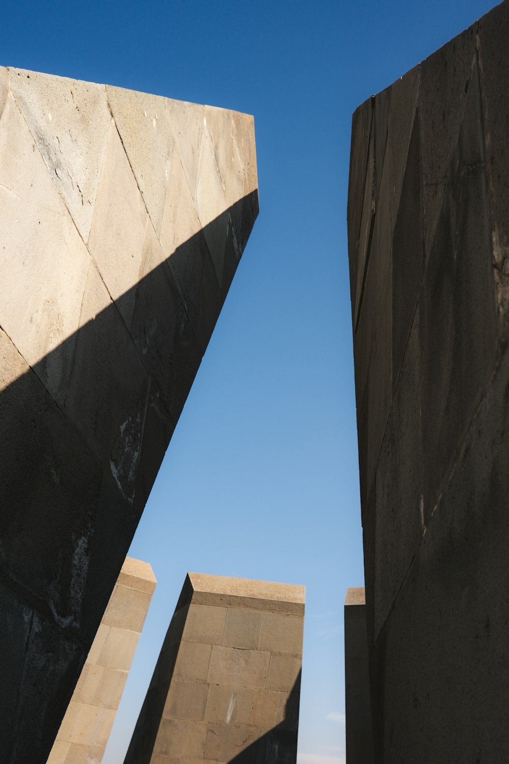 a couple of cement blocks sitting next to each other