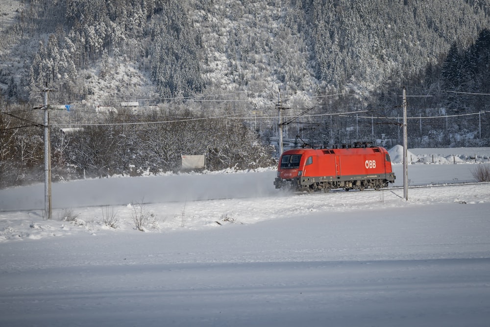 a train traveling through a snow covered countryside