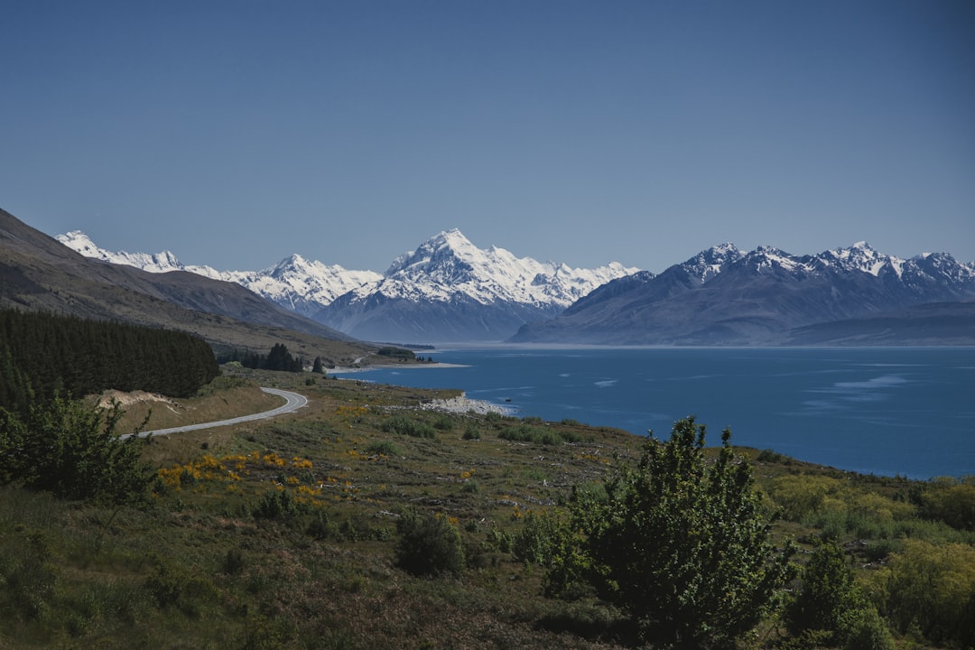 Travel documents and passport with scenic mountain landscape