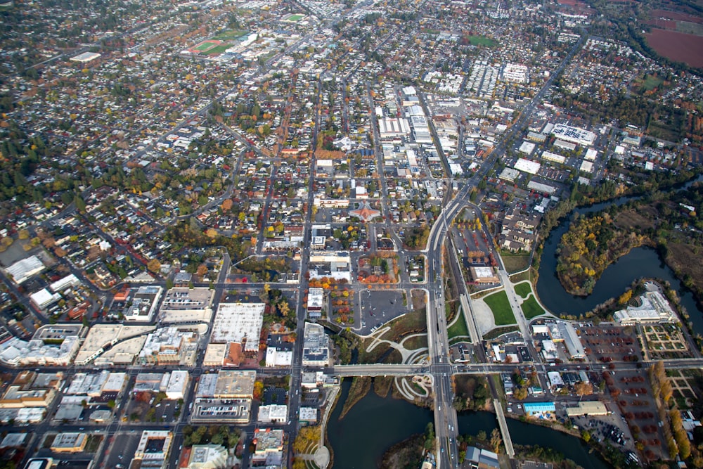 an aerial view of a city with a river running through it