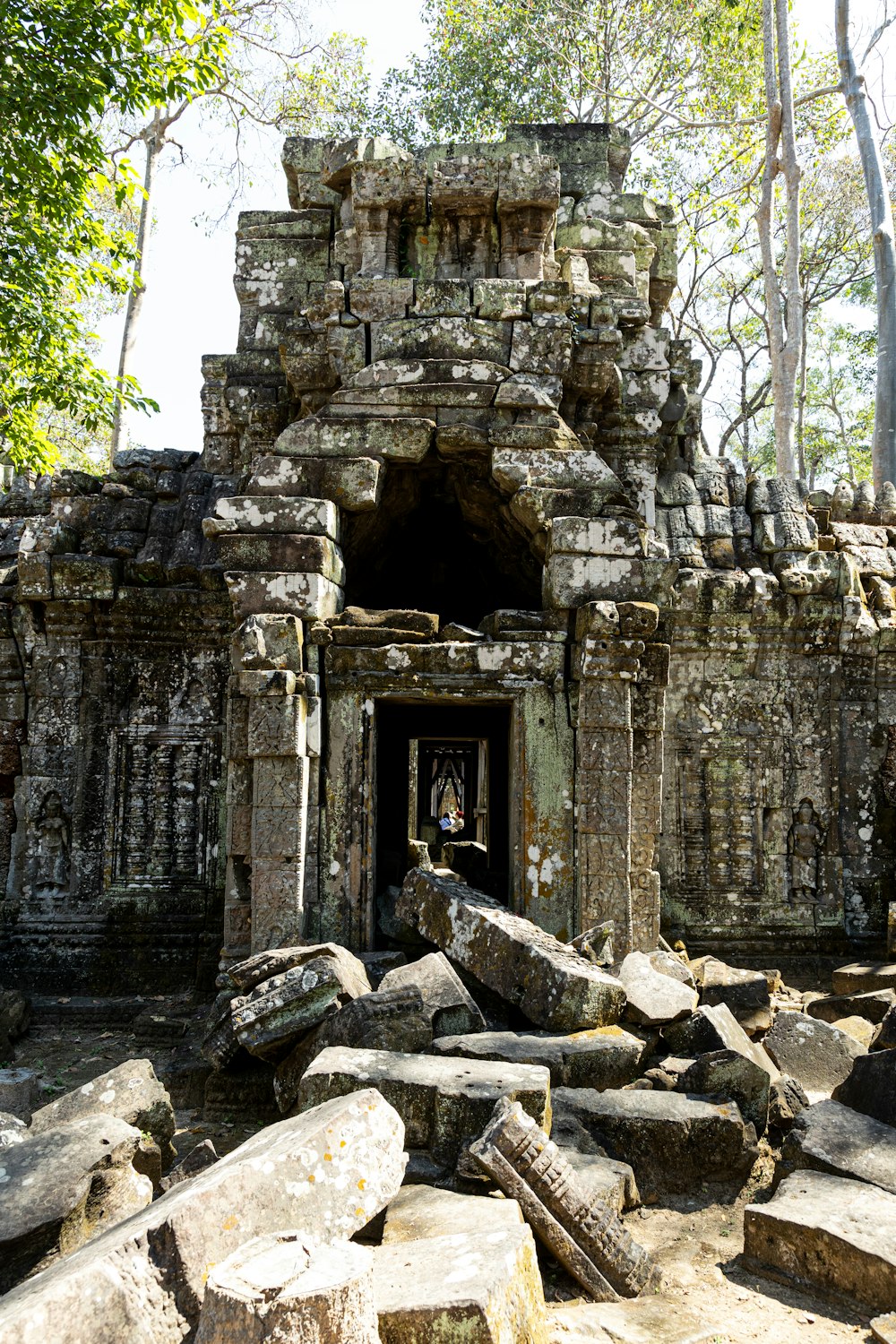 a stone structure with a doorway in the middle of it