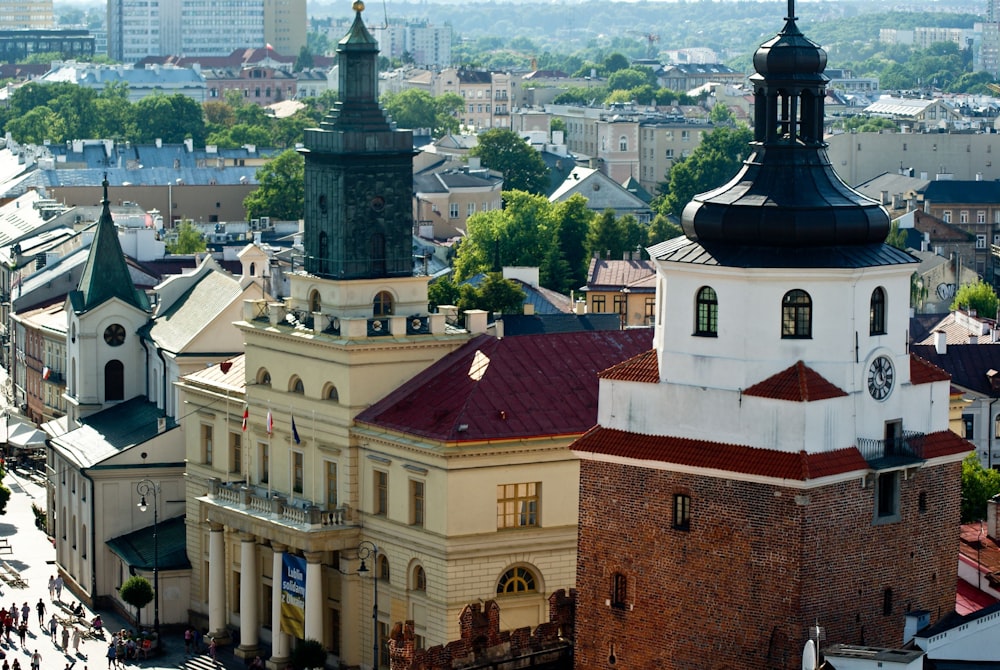 a view of a city with tall buildings and a clock tower