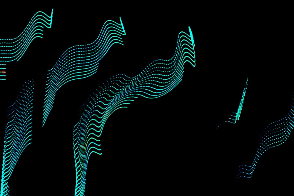 a black background with a blue pattern of wavy lines