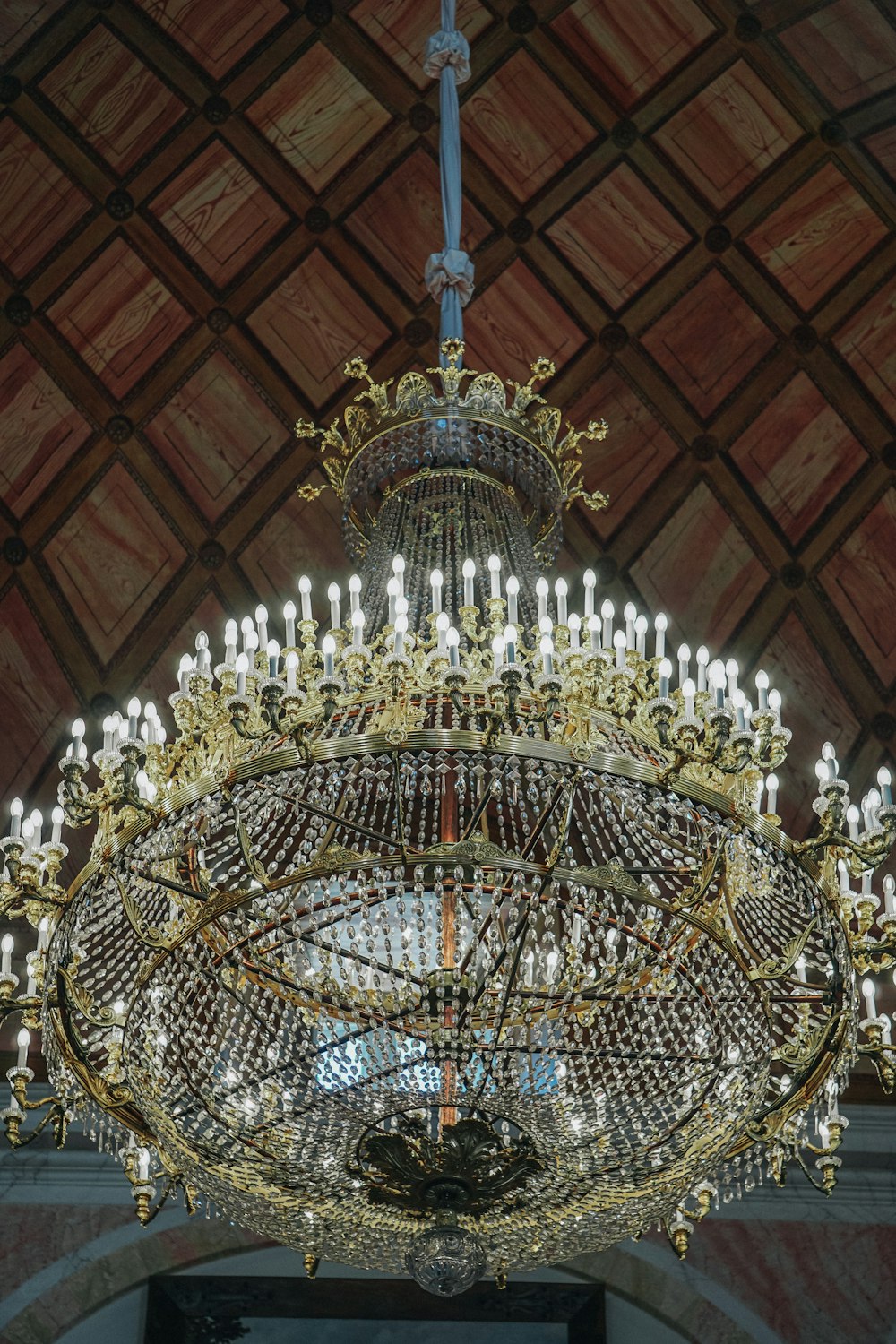 a chandelier hanging from the ceiling of a building