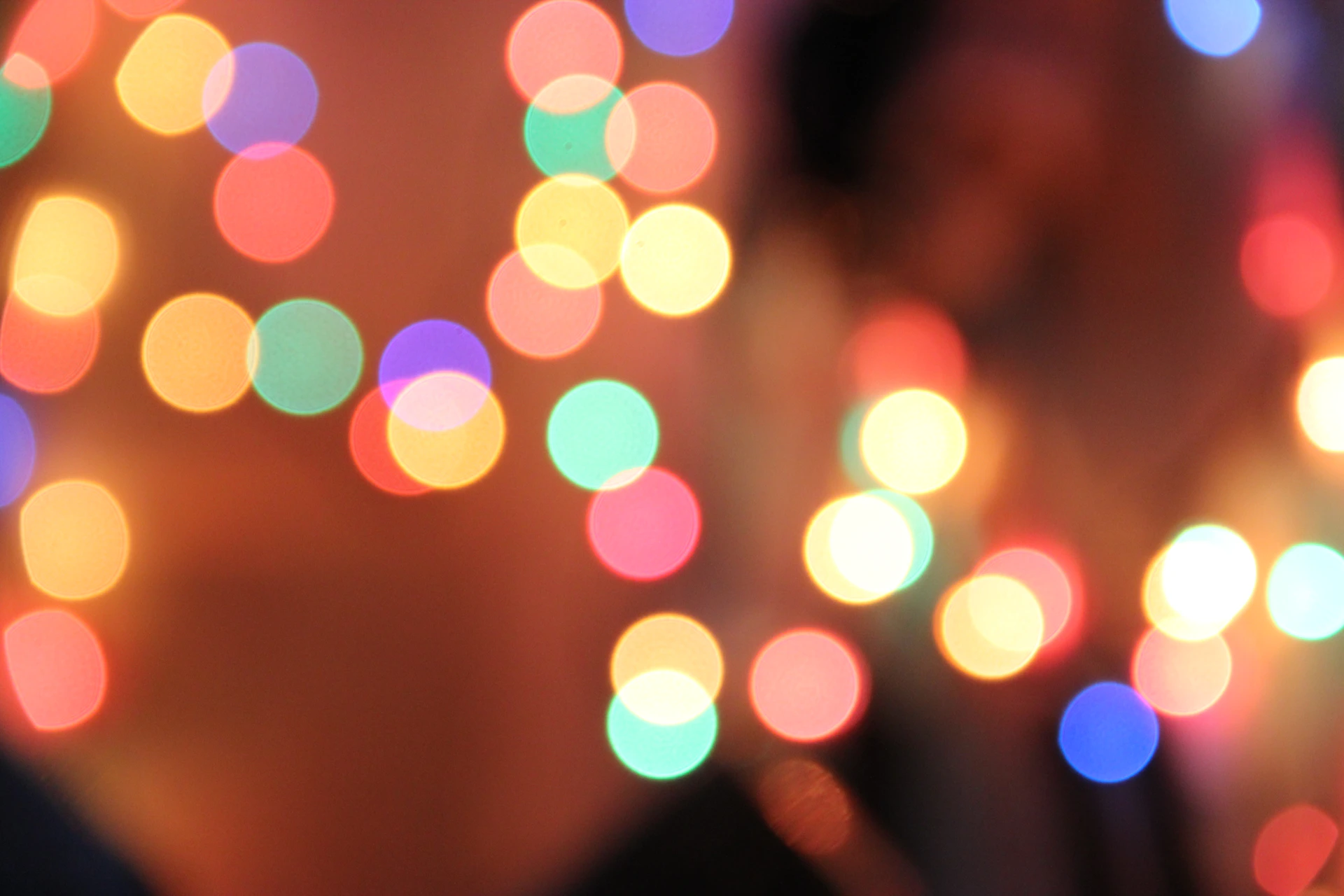 a blurry photo of a person with a cell phone