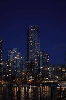 Evening cityscape of Genoa highlighting the connection between the agency and its home city
