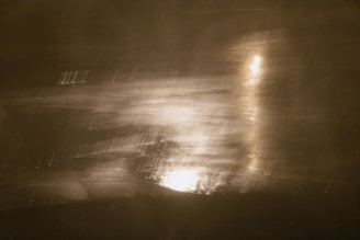 Abstract patterns glowing softly in dim light.