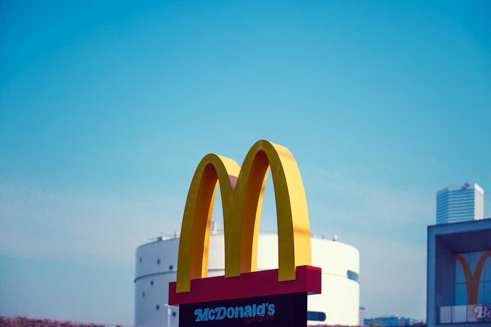 a mcdonald's sign in front of a building