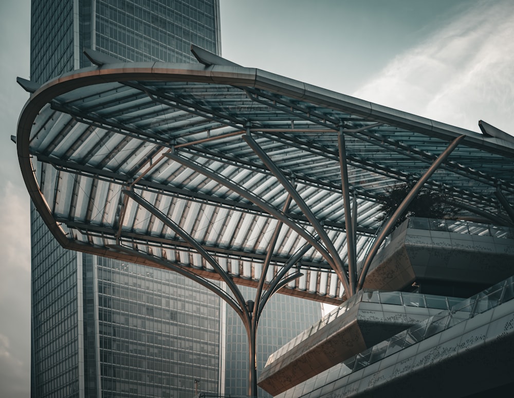 a large metal structure with a sky background