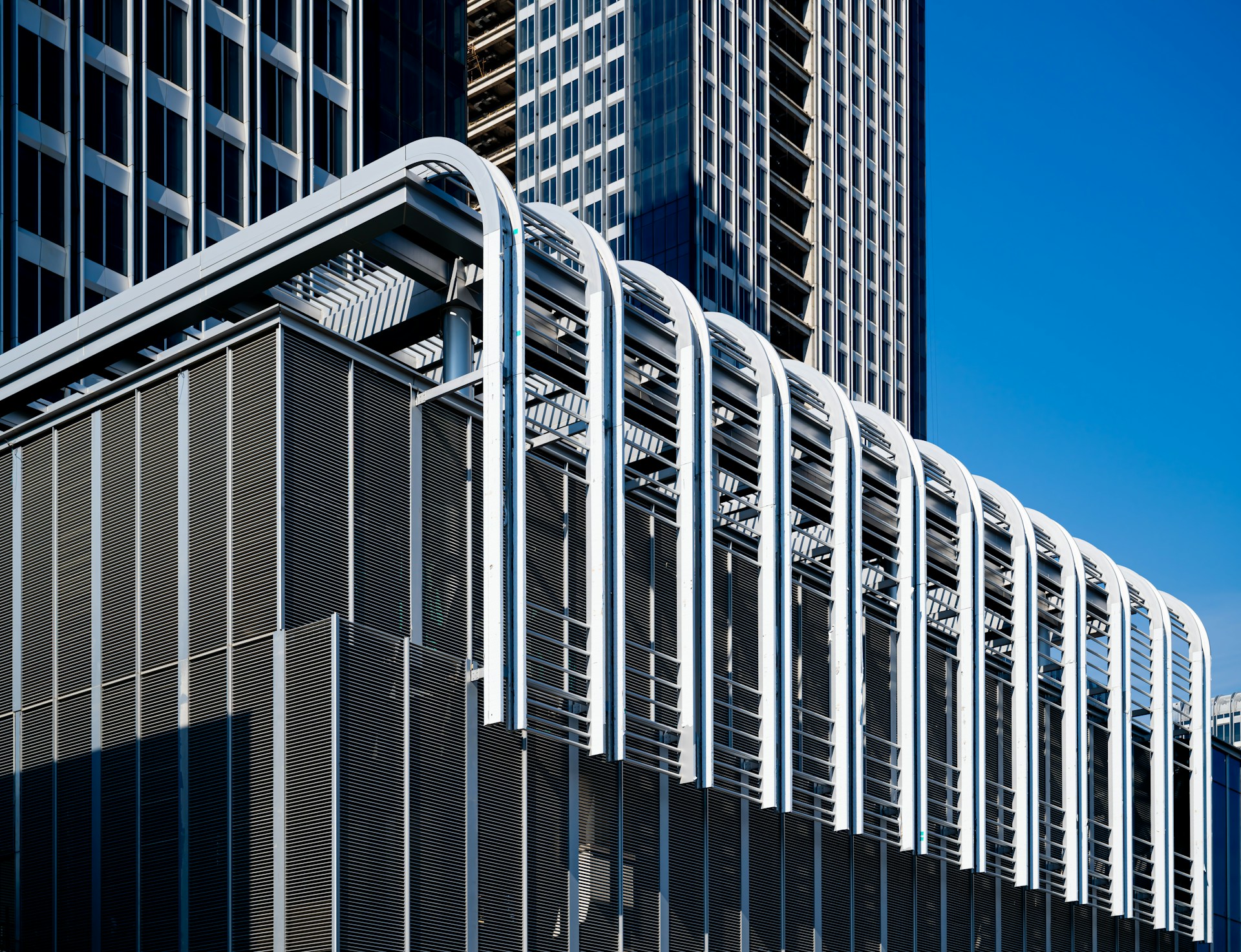 woman wearing yellow long-sleeved dress under white clouds and blue sky during daytime