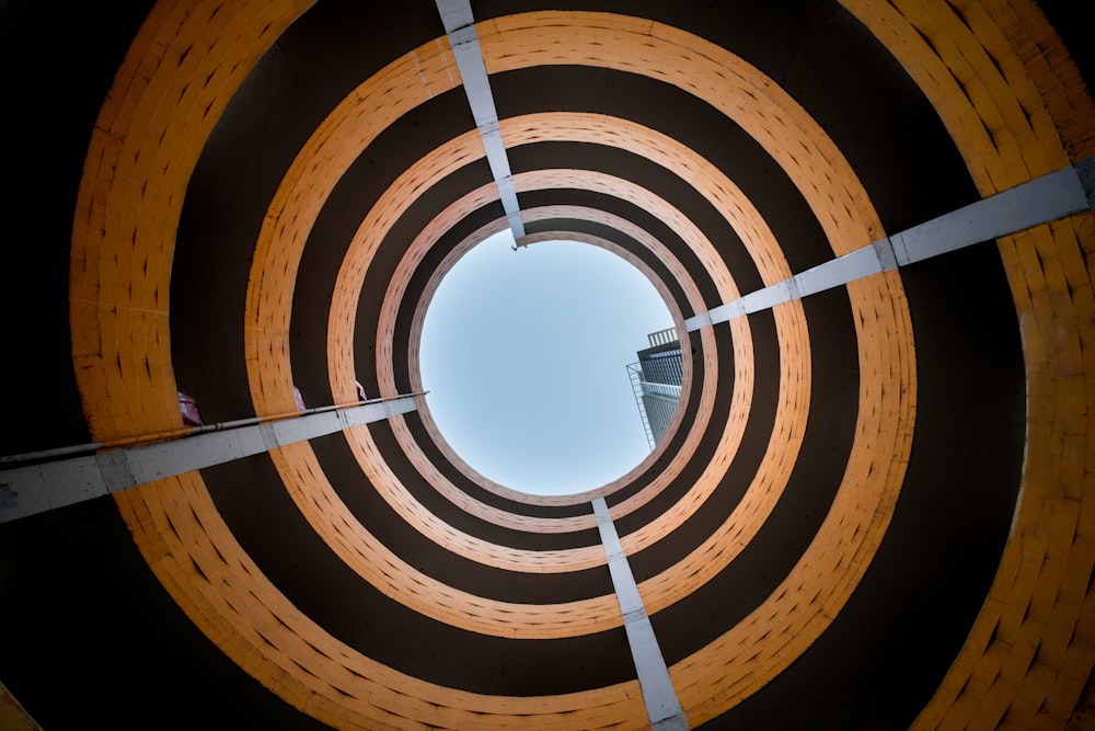 a view looking up into the center of a circular structure
