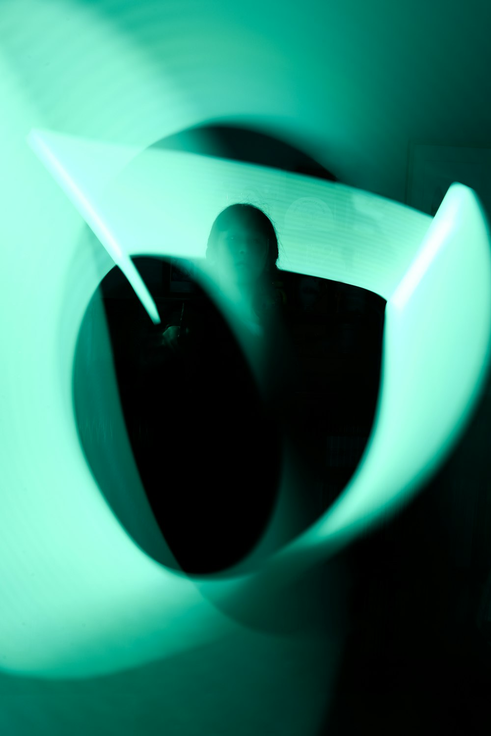 a close up of a green object with a blurry background