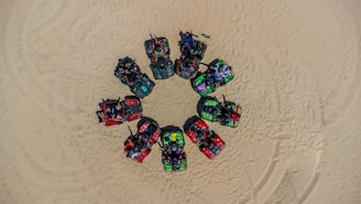 A group of friends riding ATVs together, laughing and enjoying the rugged terrain.