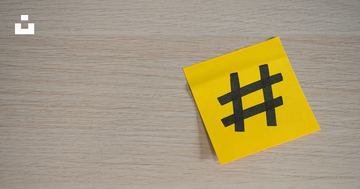 A yellow piece of paper with a hash symbol on it photo – Free Post-it ...