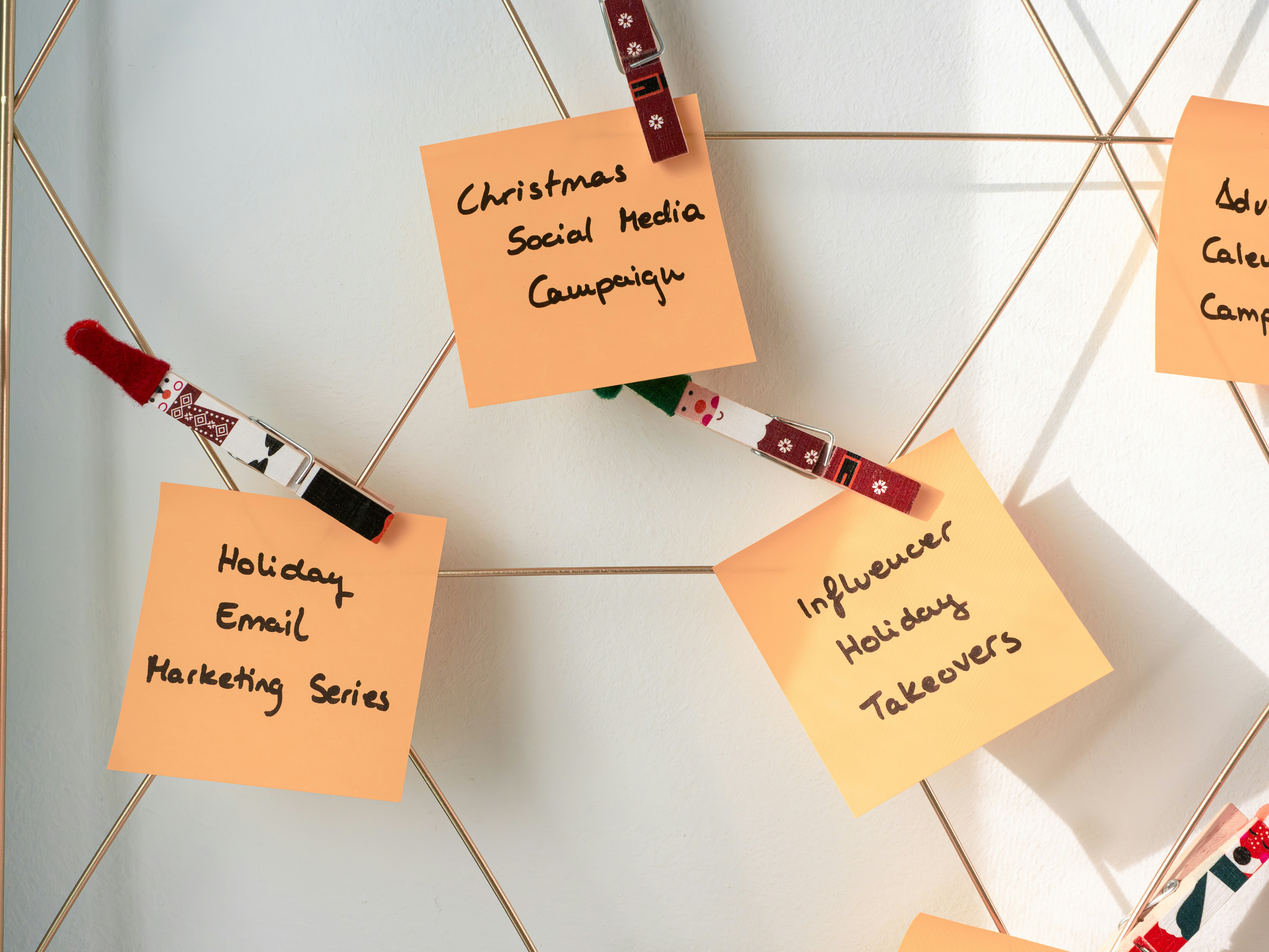 Post-its with holiday marketing ideas written on them