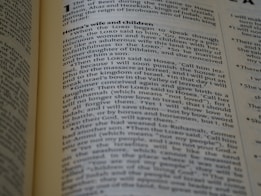 The page from a religious text, likely a Bible, includes paragraphs discussing Hosea's wife and children with detailed passages of biblical narrative. The text is formatted in two columns with a heading at the top.