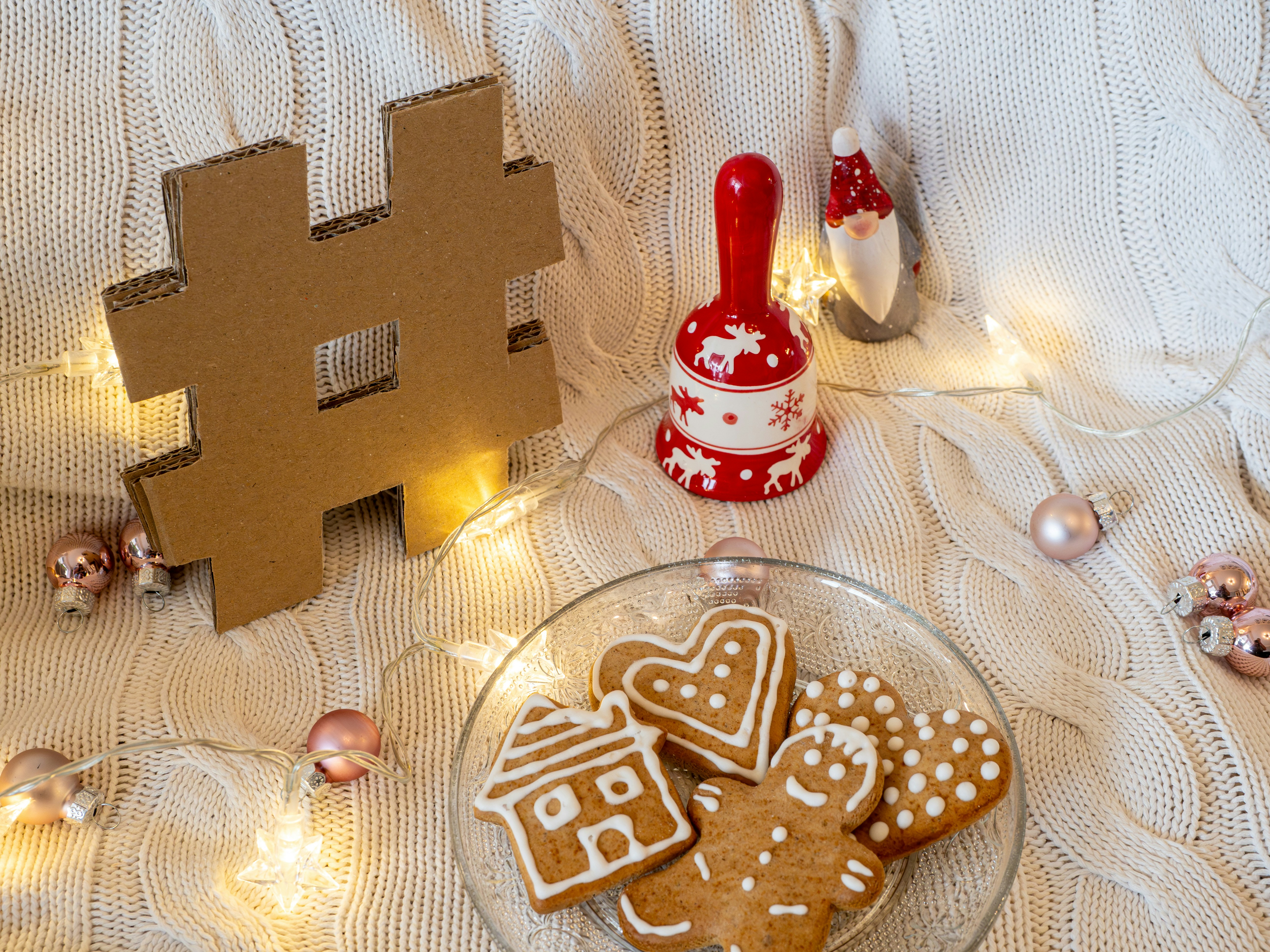 Christmas decorations with a cardboard hashtag on a white background