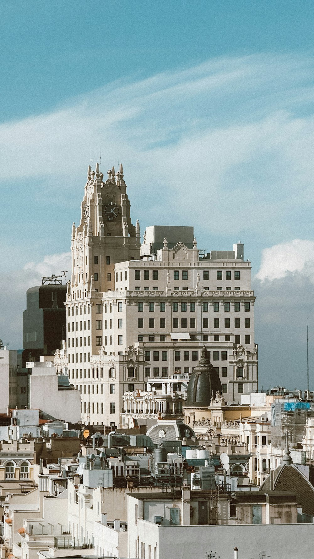 a view of a city with tall buildings