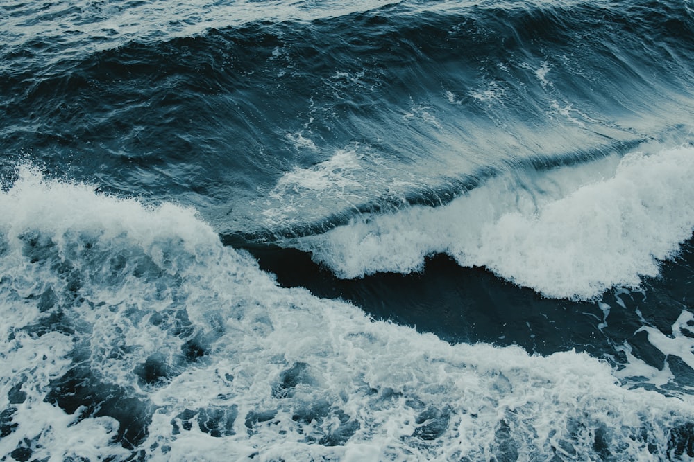 a large body of water with waves coming in