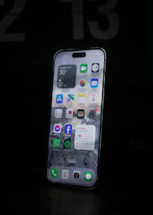 A sleek smartphone displayed with a vibrant screen showcasing the latest apps.