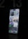 A modern smartphone is displayed with a lit-up screen showing various app icons, including weather, calendar, and social media applications, against a dark background. The screen's brightness highlights the device's sleek design.