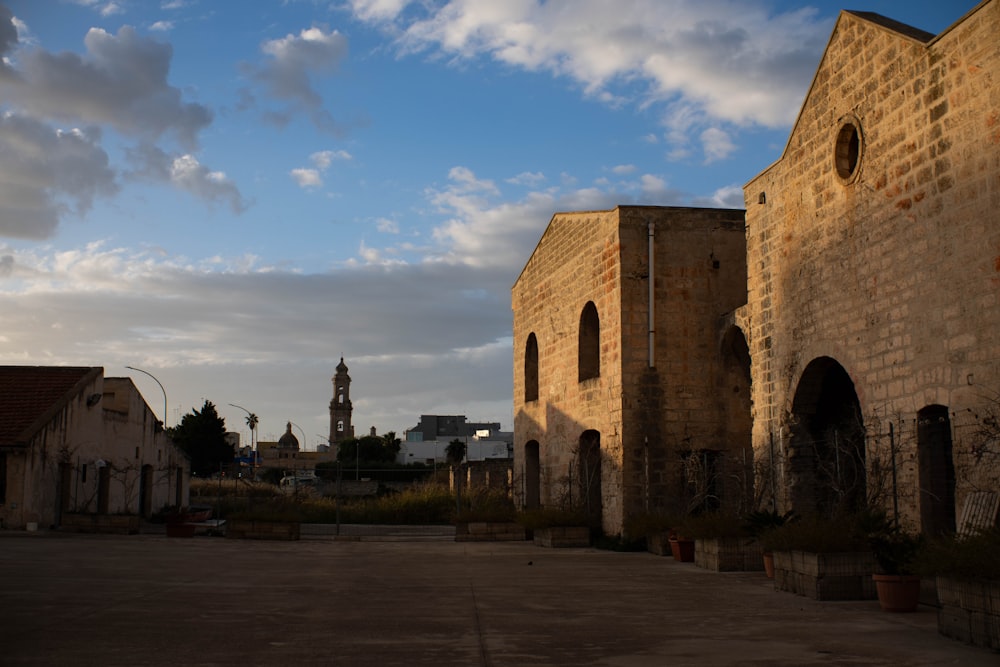 a building with a clock tower in the background