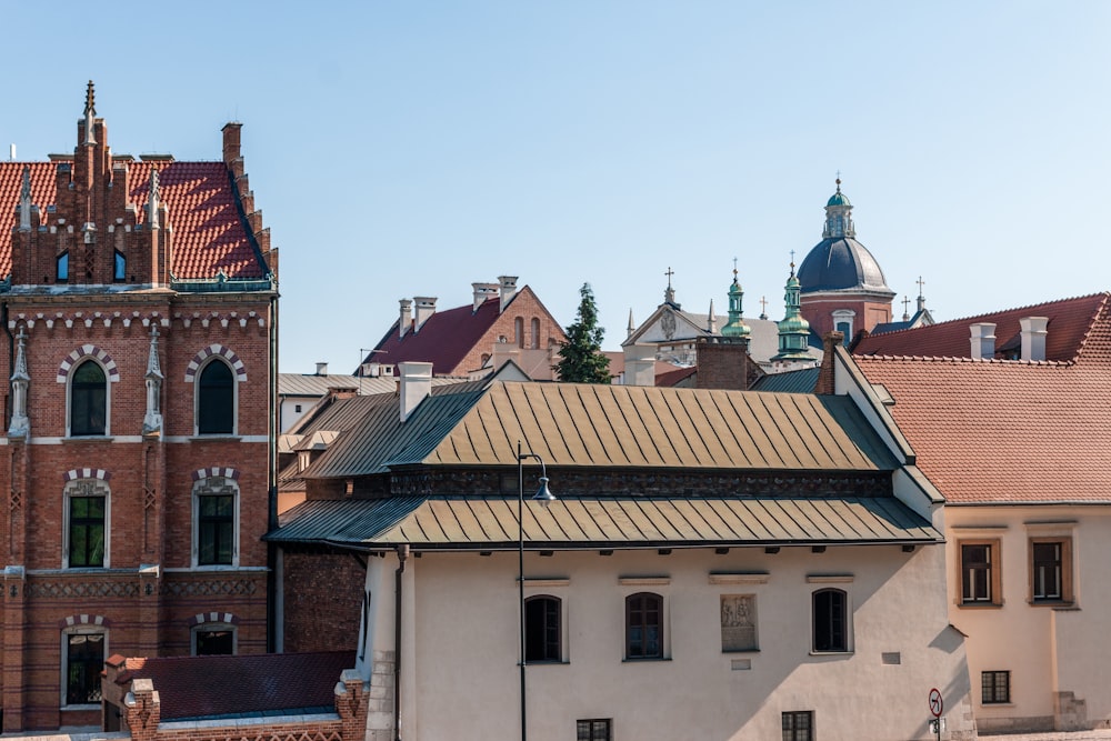 a view of a building with a clock tower in the background