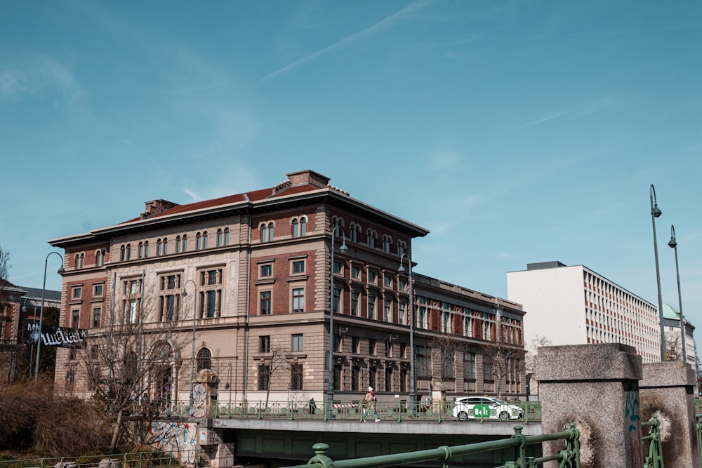 a large building with a bridge over it