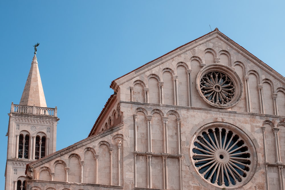 a large cathedral with a clock on the front of it