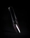 A close-up of premium barber scissors showcasing their sharp blades.