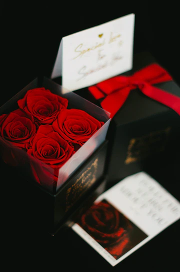 Close-up of a beautifully engraved wooden gift box with a heartfelt message.