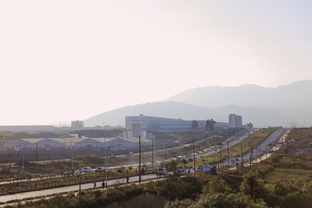 a view of a city with mountains in the background