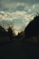 A quiet street corner bathed in soft morning light.