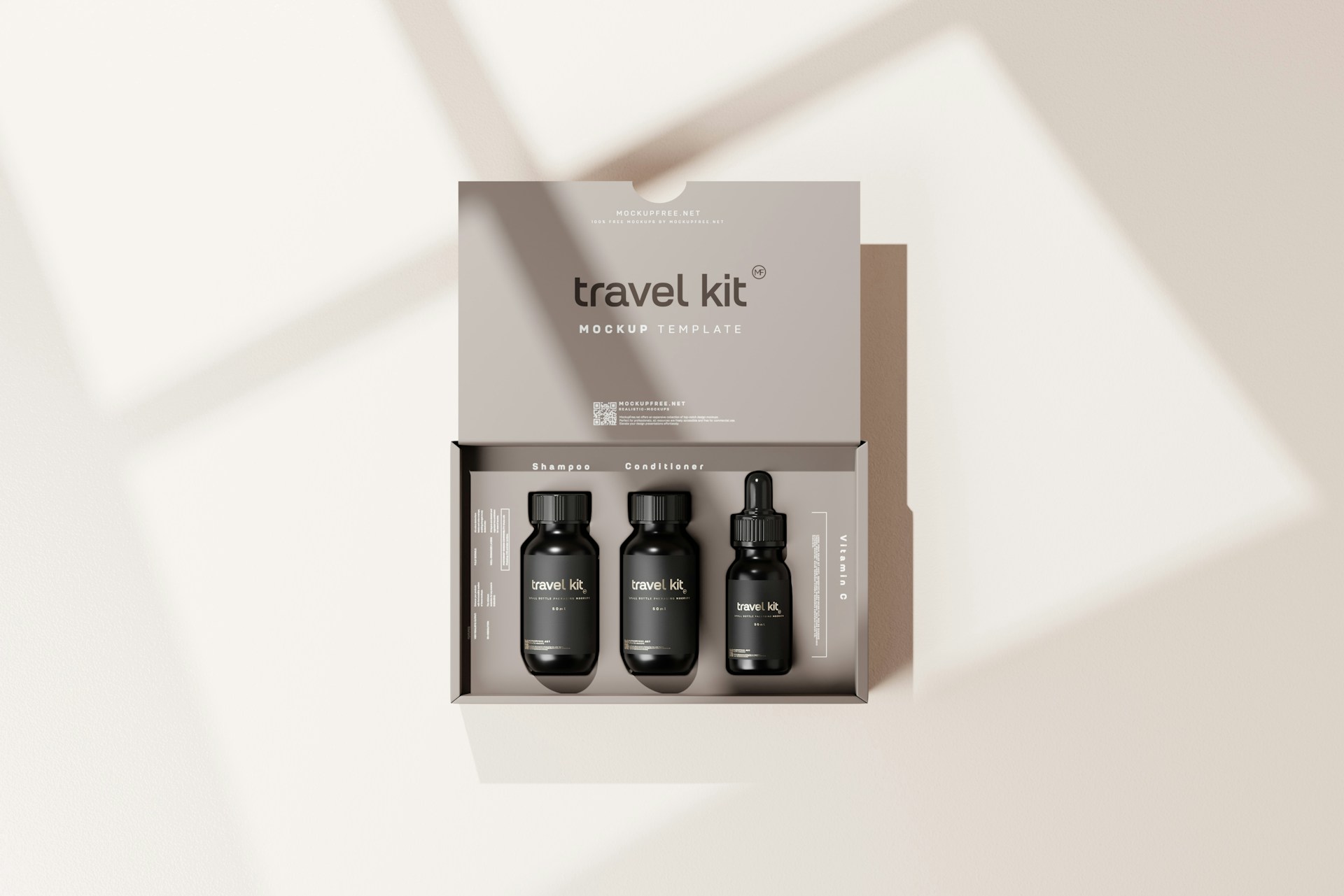 three bottles of travel kit in a box