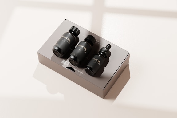 A warm, natural product setup with CDS, MMS, and DMSO bottles on a wooden table bathed in soft sunlight.