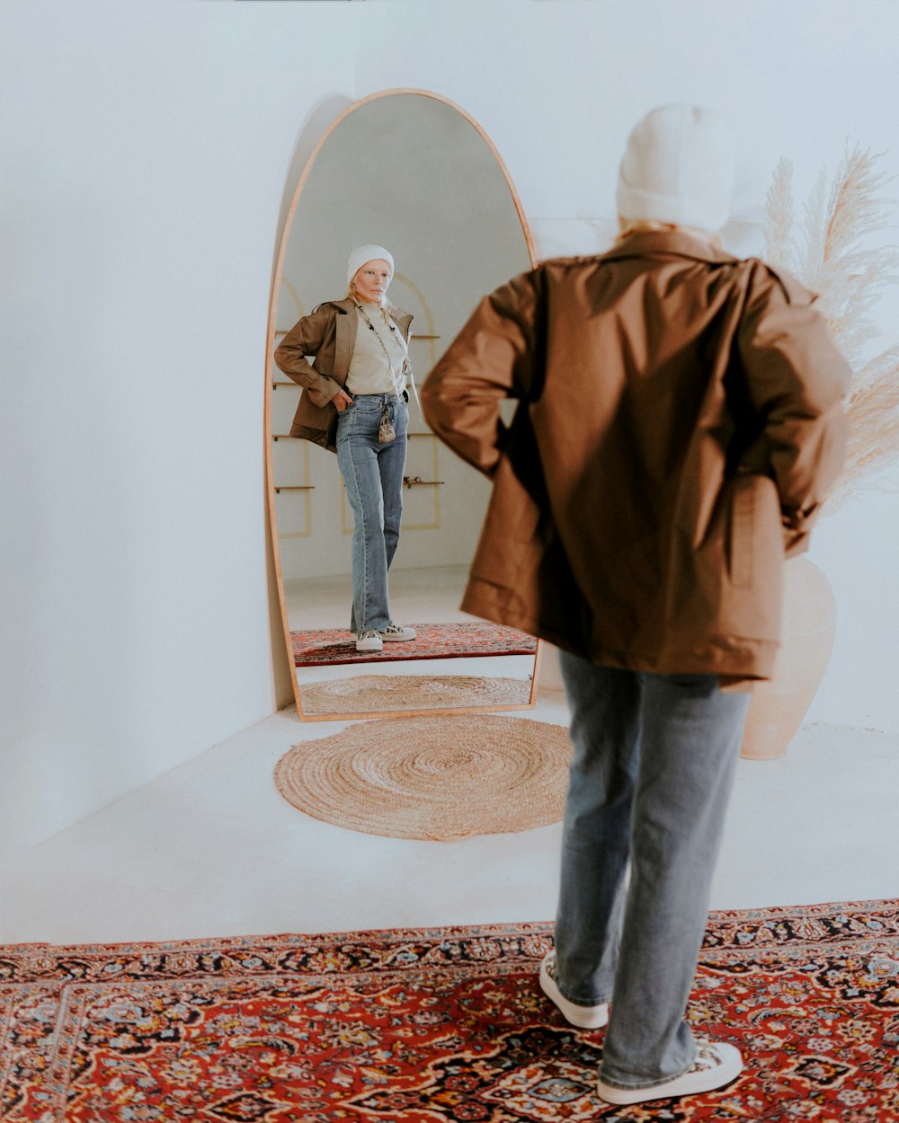 a person standing in front of a mirror