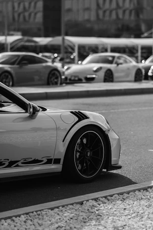 Photo of a variety of imported cars lined up ready for delivery in Mali.
