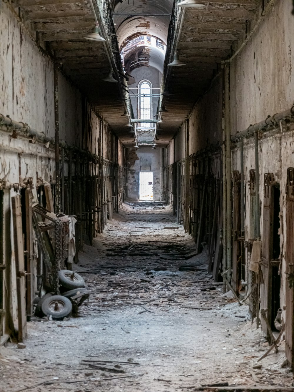 a very long hallway with a bunch of doors