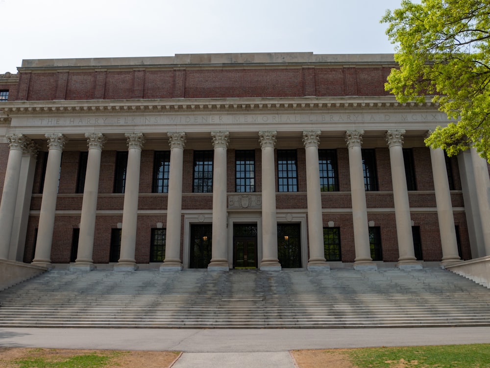 a large building with columns and steps leading up to it