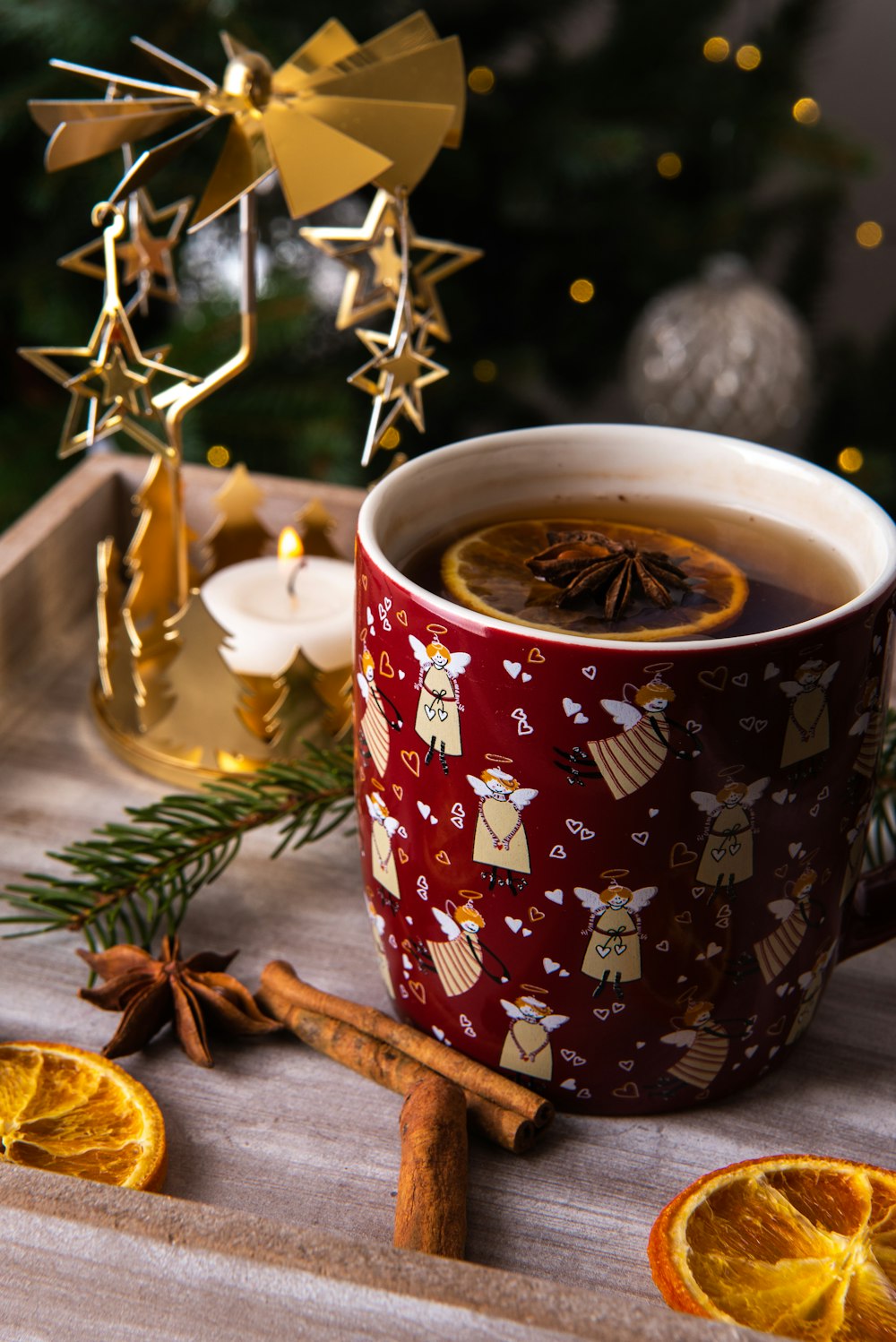 a cup of tea sitting on top of a wooden table